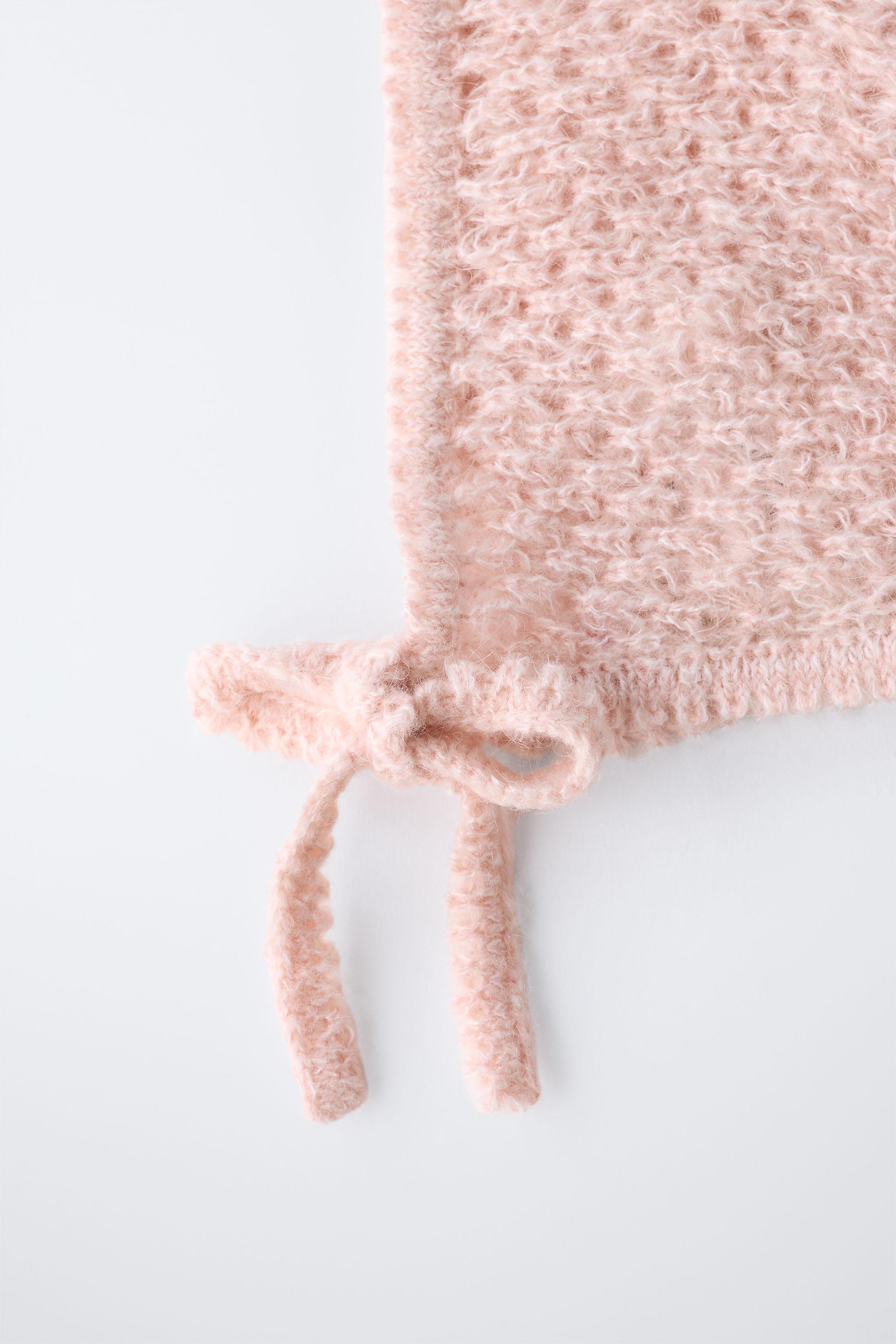 BONNET EN MAILLE AVEC LAINE